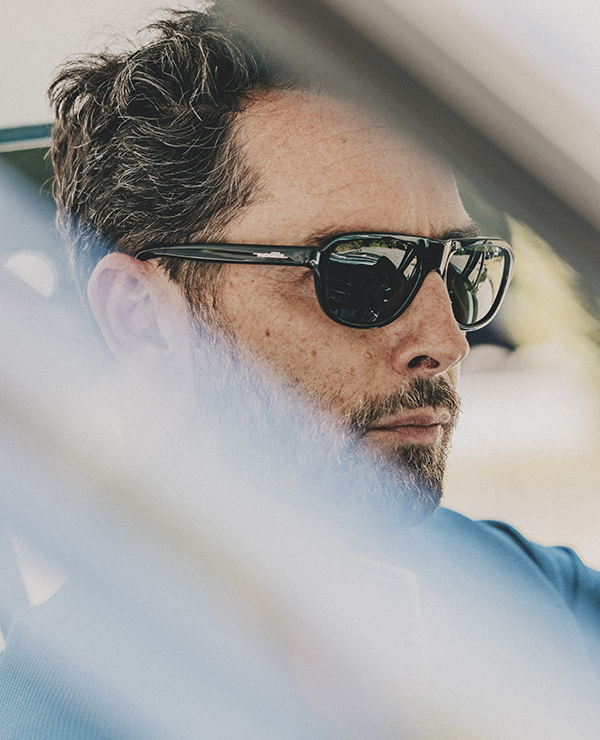 Cool gentleman with black sunglasses in retro design